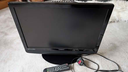 Photo of free 22" TV with built-in DVD player (Bystock EX8) #1