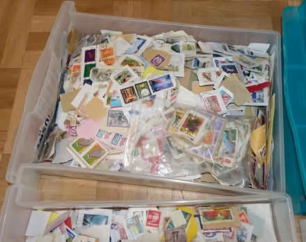 Photo of free Five containers of collectable postage stamps, on/off paper (Kingsway) #1