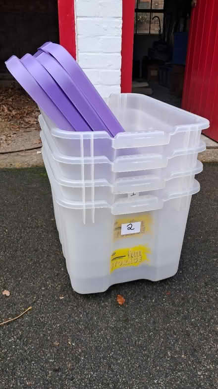 Photo of free 4 Stackable Plastic boxes (GU22 Park Road Woking) #1