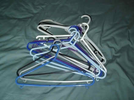 Photo of free Dozen Plastic Coat Hangers (Yateley GU46) #1