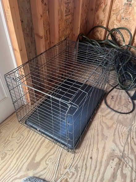 Photo of free Med/Large Dog crate (22315) #1