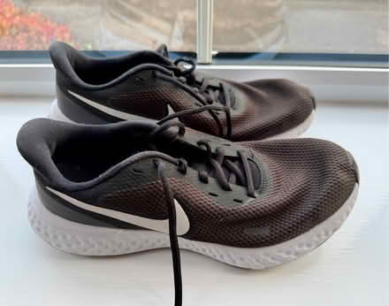 Photo of free Nike basic black trainers (used for school) size 7 (Arborfield Garrison RG2) #1