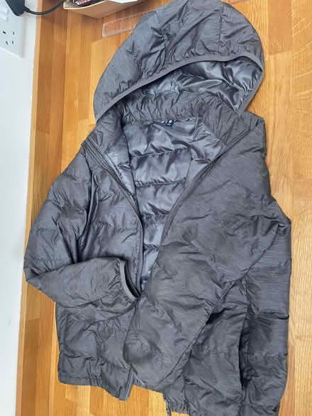 Photo of free Uniqlo age 13 grey puffa jacket (Woodmancote GL11) #1
