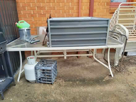 Photo of free large glass topped outdoor table (Whalan. NSW 2770) #1
