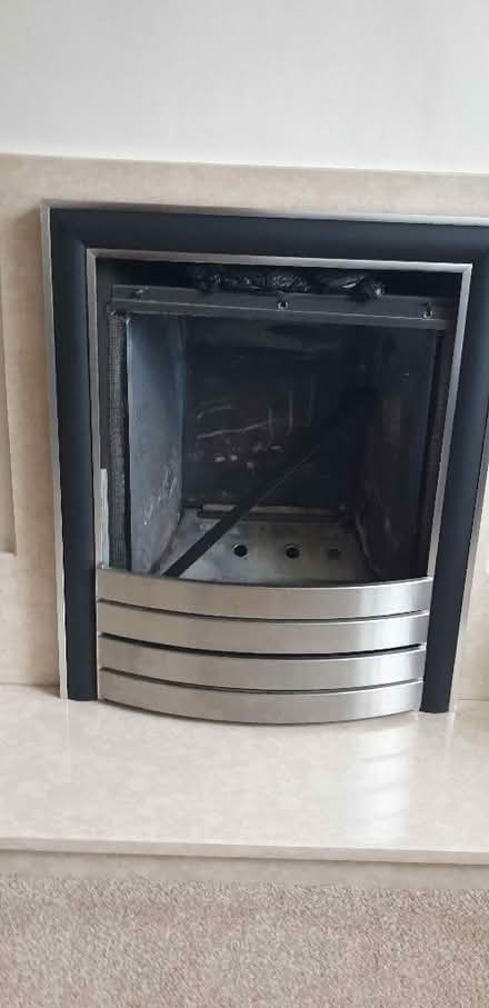 Photo of free Gas fire surround in silver and black (Whitnash CV31) #1