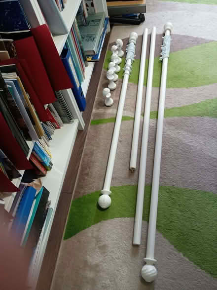 Photo of free 2 white wooden curtain poles with rings (Shelton Lock DE73) #2