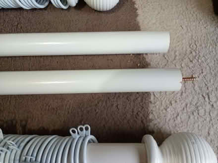 Photo of free 2 white wooden curtain poles with rings (Shelton Lock DE73) #3