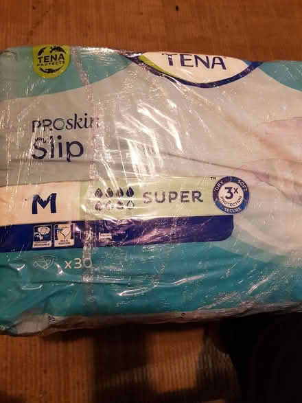 Photo of free Tena adult nappies... size M (Shepperton TW17) #1