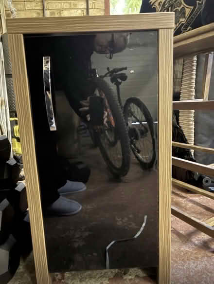 Photo of free Brown wood cupboard with black door (Slough) #1