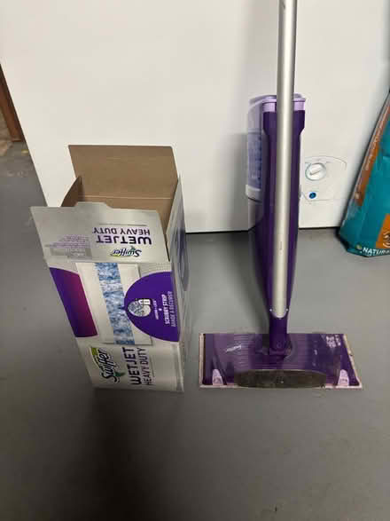 Photo of free Swiffer wet jet and a few pads (East Northport) #1