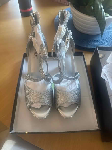 Photo of free Size 11 silver heels (Jackson Heights) #1