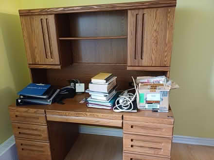 Photo of free Large computer desk with oak doors (Near the NRC.) #1