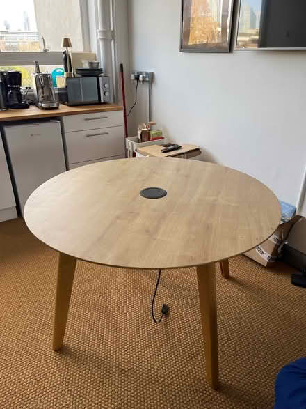 Photo of free Round wooden table with plug socket (St John Street, Farringdon) #1