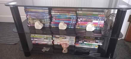 Photo of free Tv cabinet + DVDS (CA14) #1
