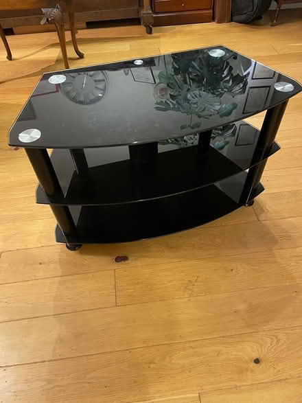Photo of free Glass TV unit, 3 shelves, divides (chichester) #1