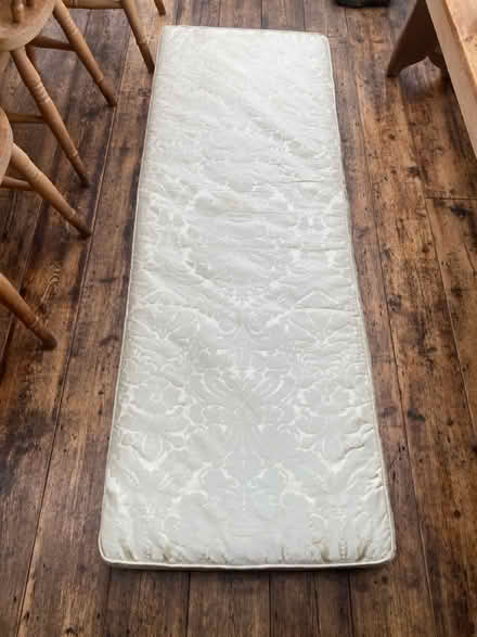 Photo of free Large Cream covered foam cushion (Chiddingfold) #1