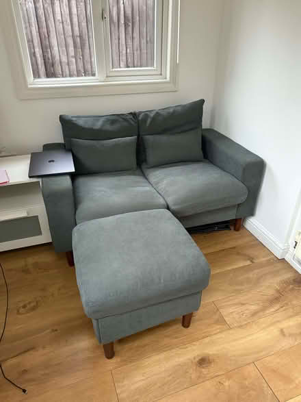 Photo of free Two seater sofa with pouffe - high demand / earliest offer g (Acton W3) #1