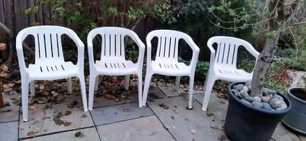 Photo of free 4 white plastic stacking chairs (Fleetville AL1) #2