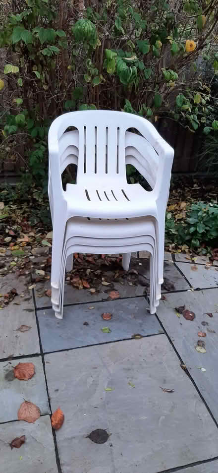 Photo of free 4 white plastic stacking chairs (Fleetville AL1) #1