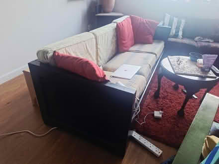 Photo of free 3 + 2 seater sofas heavy wood (Killiney) #1