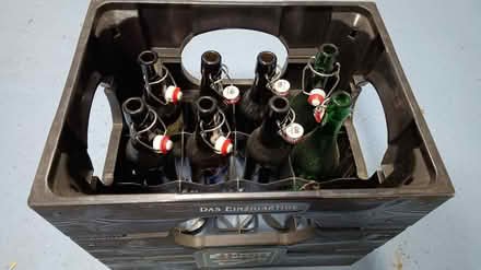 Photo of free 8 Clip top 1/2 liter beer bottles and crate (Storth LA7) #1