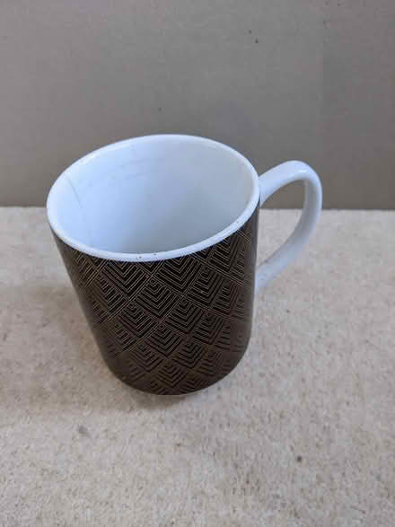 Photo of free Black and gold cup - cracked (Hastings TN34) #2