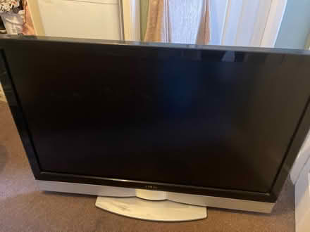 Photo of free 47” tv (Knotty ash) #1