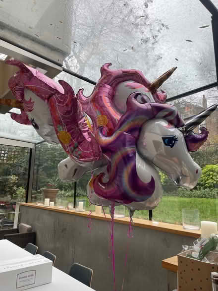 Photo of free 4 helium filled unicorn balloons with strings and weights (Canonbury N1) #1