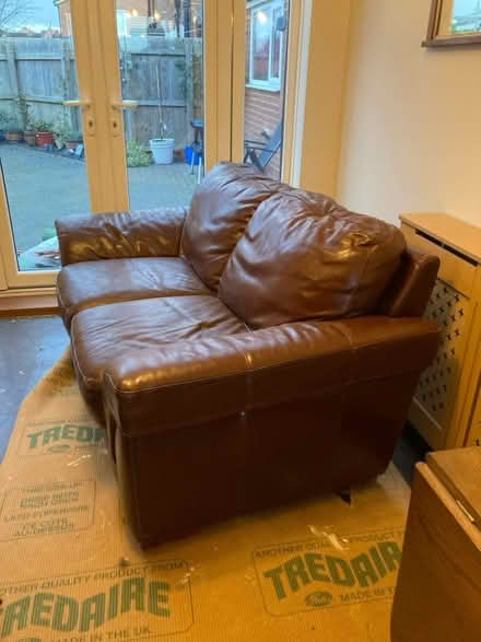 Photo of free Brown leather sofa - large seater (Ryhope) #1
