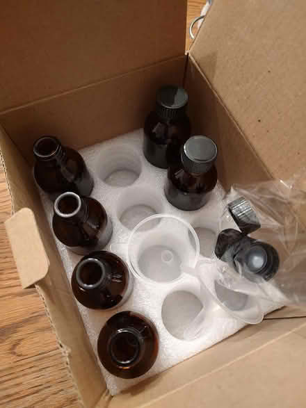 Photo of free 2 oz glass bottles (Odenton) #1