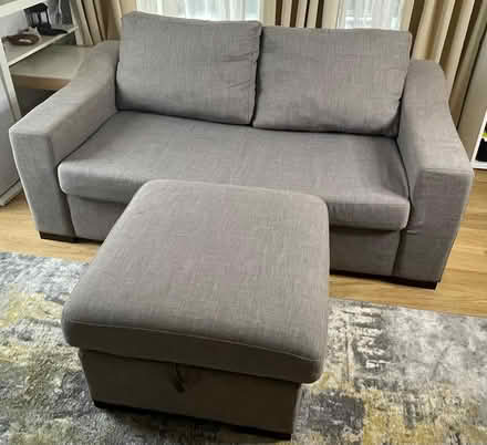 Photo of free Grey Sofa Bed & Footstool (storage) (Bermondsey SE!) #1