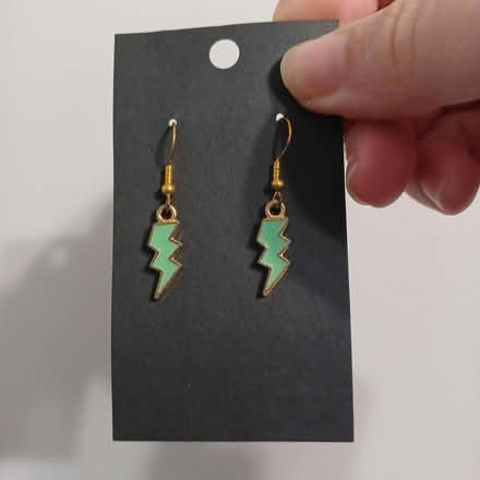 Photo of free Green lightning bolt earrings (Travis Heights) #1