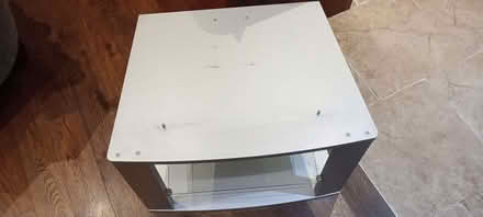 Photo of free Silver TV stand with glass shelf (Lower Sheering CM21) #1