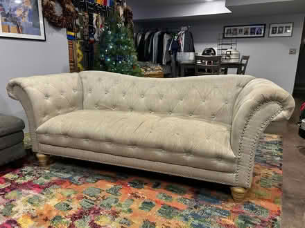 Photo of free well loved couch (Skyway) #1