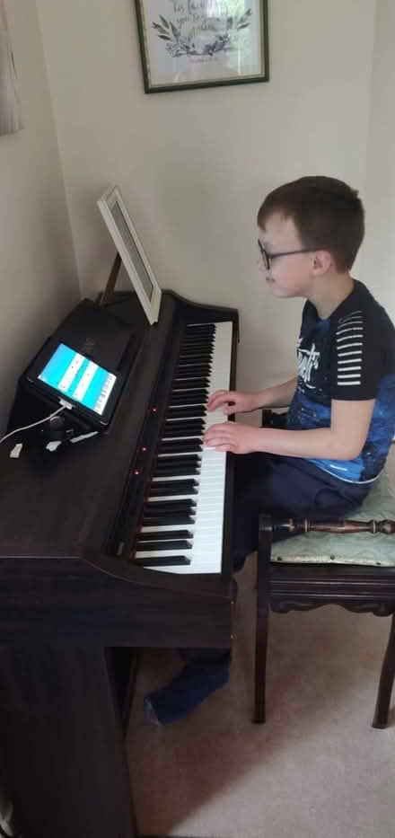 Photo of free Electric Piano & Piano Stool (Woking GU22) #1