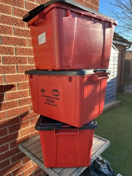 Photo of free 3 strong red storage tubs with lids (Wigston LE18) #1