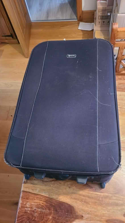 Photo of free Large black suitcase (Curbridge OX29) #2