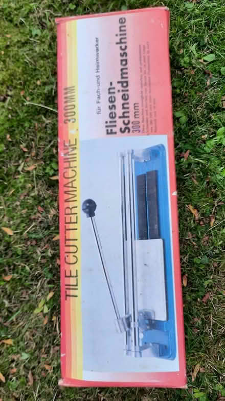 Photo of free assorted tiles, tile cutter + (Close to Wrexham Centre) #1