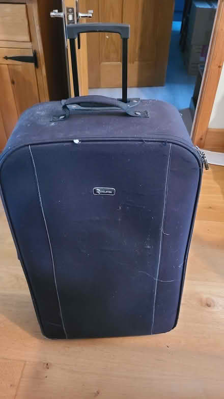 Photo of free Large black suitcase (Curbridge OX29) #1