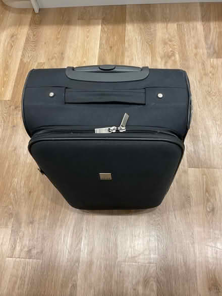 Photo of free Black medium size Tripp suitcase (Pershore WR10) #1