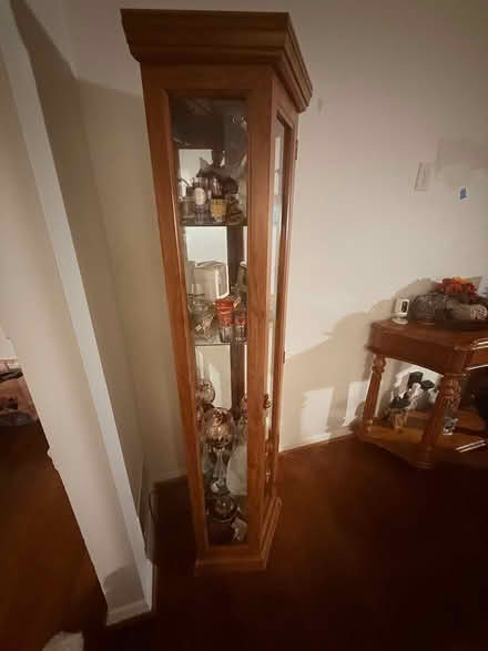 Photo of free Corner curio cabinet (Lanham area- good luck road) #3