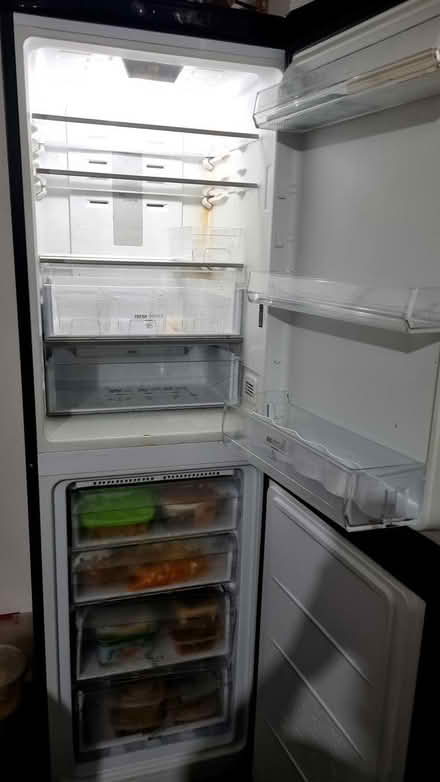 Photo of free Fridge freezer (OL9 7FE) #2