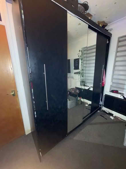 Photo of free black 2 door double sliding wardrobe (Wimbledon SW19) #1