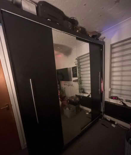 Photo of free black 2 door double sliding wardrobe (Wimbledon SW19) #4