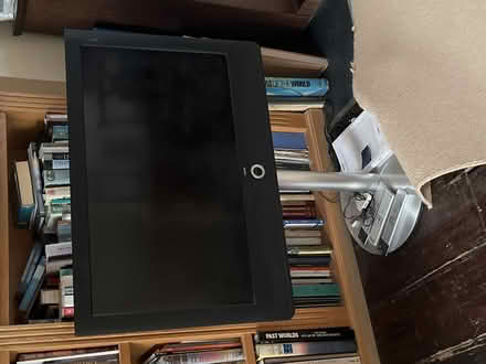 Photo of free Loewe flat screen TV with stand and remotes (Camden Town NW1) #1