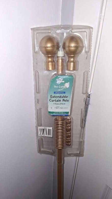 Photo of free Gold coloured extendable curtain pole. (Windygates KY8) #1