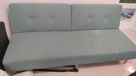 Photo of free Turquoise click clak sofa (Bermondsey station, SE16 4) #1