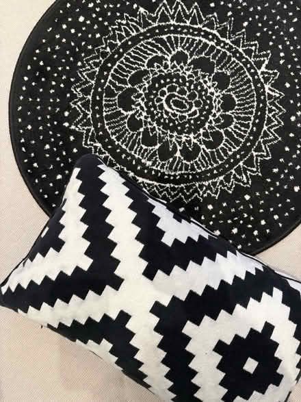 Photo of free Small black and white rug and cushion (Walham Green SW6) #1
