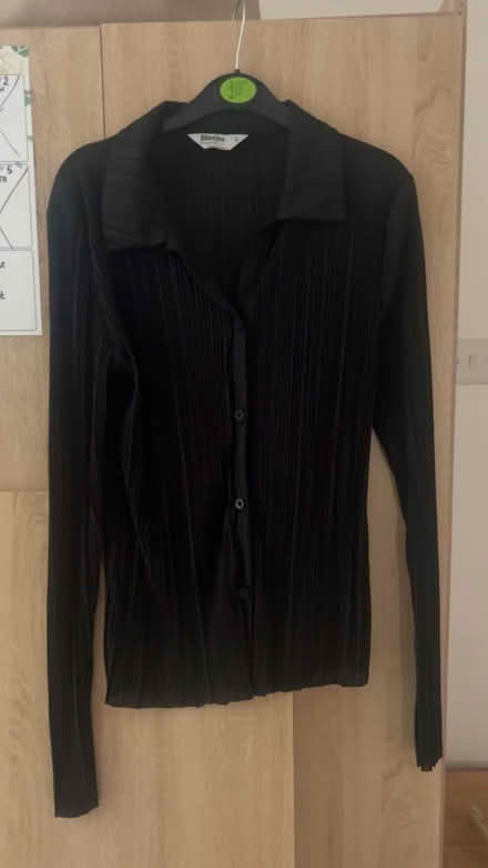 Photo of free Women’s black blouse (Coulsdon town station) #1