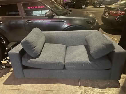 Photo of free Curb alert: Gray sofa (Upper East Side) #1